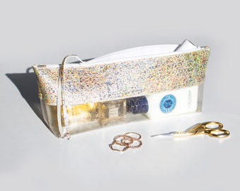 Borsa da viaggio trasparente olografica, astuccio con cerniera trasparente glitterato, beauty case da viaggio in vinile, beauty case iridescente, astuccio trasparente