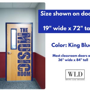 a door with a large text design on it, indicating the door is for a classroom or a room with a King Blue color.