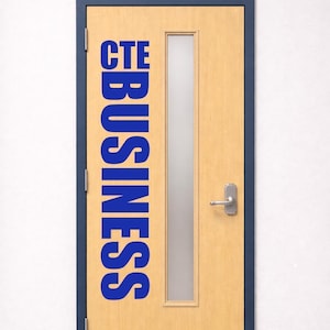 May include: A light wood door with a dark blue frame featuring a vertical blue sign that reads CTE BUSINESS. The door includes a narrow rectangular frosted glass window, a silver metal handle, and a silver kick plate at the bottom.