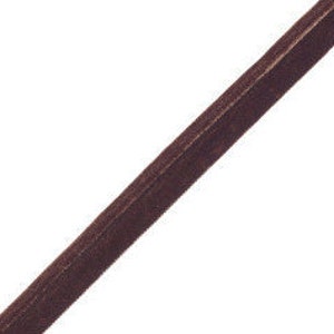 May include: A single strip of dark brown velvet ribbon positioned diagonally across the frame. The ribbon features a soft, textured pile surface with a consistent deep brown colour and finished edges running along both sides of the length.
