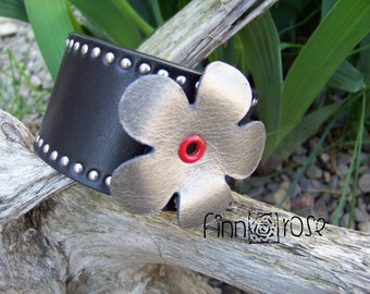 Twilight.  Women's leather bracelet.  Black Leather Cuff Bracelet with Riveted Border and Metallic Silver Flower