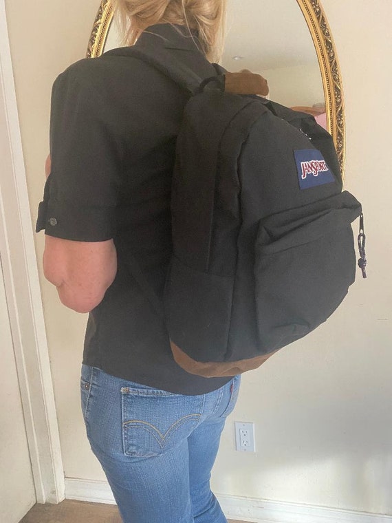 Black Jansport Backpack Leather Bottom, Nylon wit
