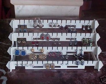 Earring rack,earring display, display, organizer ,holds 32 pairs, 4 tier, hard plastic ,jewelry holder, rack