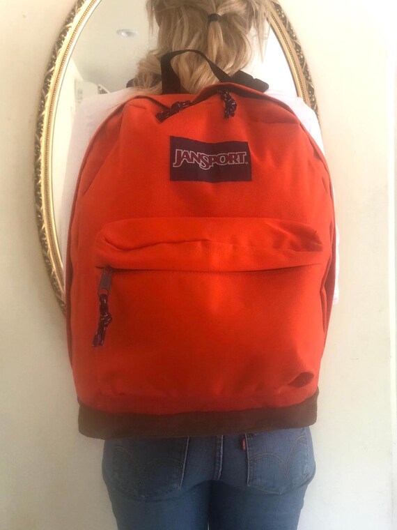 Orange Jansport backpack,Leather Bottom,Backpack b