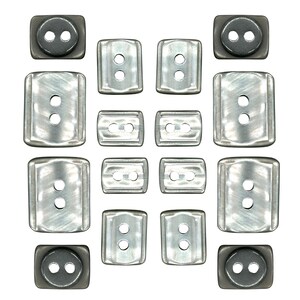 May include: An assortment of silver-toned metal buttons in various rectangular and square shapes. The buttons have two holes for sewing and a slightly textured surface. The buttons are arranged on a white background.