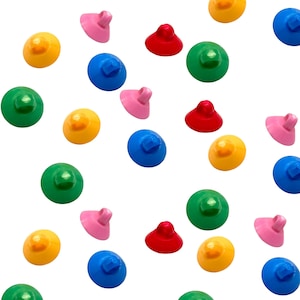 May include: Assortment of colorful suction cups in various shapes and sizes. The suction cups are made of a soft, flexible material and are perfect for hanging lightweight items.