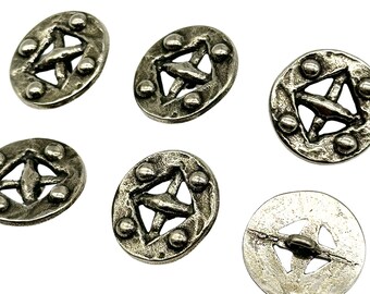 May include: Six silver-toned metal buttons with a geometric design. Each button has a raised, circular center with a cross-shaped pattern and four smaller raised circles around the edge.