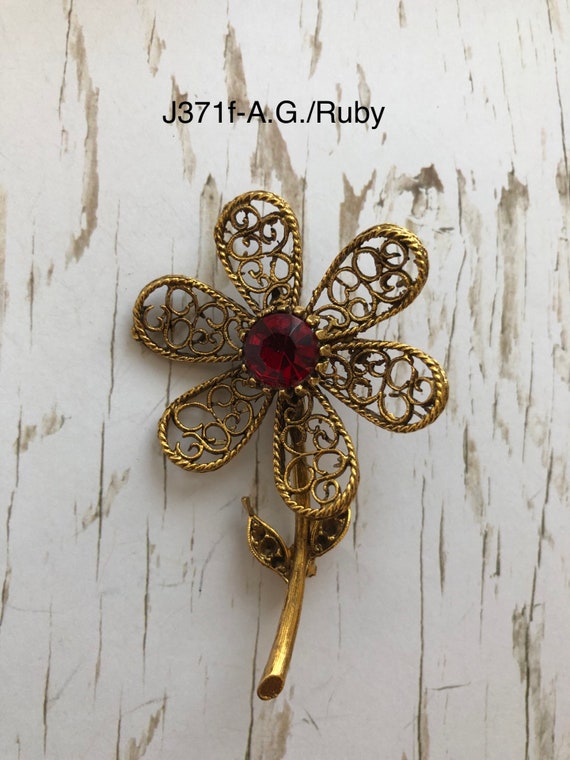 Metal brooch on sale