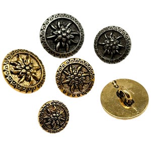 以下が含まれることがあります： エデルワイスの花柄の金属製のボタンが6つ。ボタンは金色と銀色です。