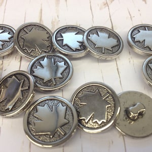 1 Dozen(i package) Vintage "Canadian Maple Leaf" Pattern ABS Plated Shank Buttons (K648) available in 2 colorways and various sizes