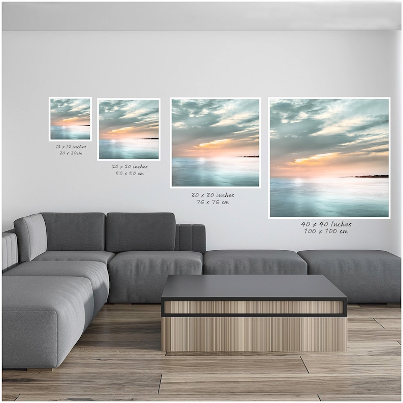 May include: Four different sizes of a canvas print with a seascape image. The image features a blue and green ocean with a sunset sky. The print is available in 30x30cm, 50x50cm, 76x76cm, and 100x100cm.