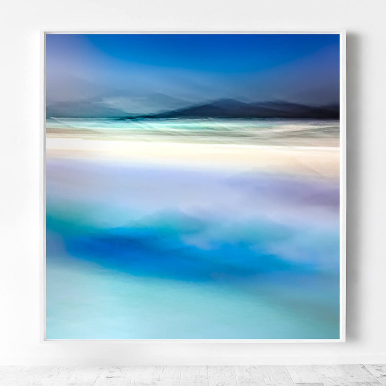 May include: Abstract painting depicting a beach scene with a blue sky, white sand, and blue water. The painting has a blurred effect, creating a sense of movement and tranquillity.