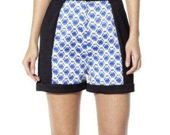 Peter Pilotto pantalones cortos acolchados de malla azul con ribete negro