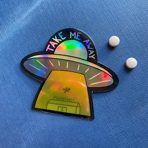 UFO Take Me Away Pharmacy Holographic Sticker | 3 in. by 2.98 in.