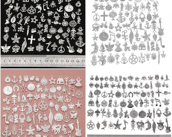 May include: A large assortment of silver charm pendants featuring various designs, including hearts, stars, anchors, musical notes, and more. The charms are arranged in a grid pattern on a pink background.