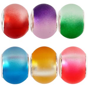 May include: Six ombre glass beads with silver accents. The beads are red, purple, green, blue, orange, and pink.