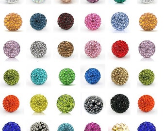 May include: Assortment of 25 round, crystal-covered beads in various colors, including red, blue, green, pink, purple, orange, yellow, and silver. The beads are approximately 1 inch in diameter.