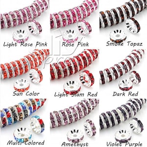 Puede incluir: Surtido de tapas de cuentas de cristal de imitación en varios colores, incluyendo rosa claro, rosa, topacio ahumado, color sol, rojo Siam claro, rojo oscuro, multicolor, amatista y morado.