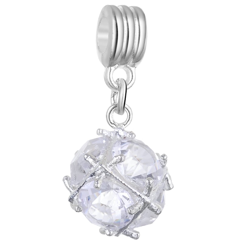 May include: A silver charm featuring a clear crystal ball encased in silver branches. The charm has a silver loop for attaching to a bracelet or necklace.