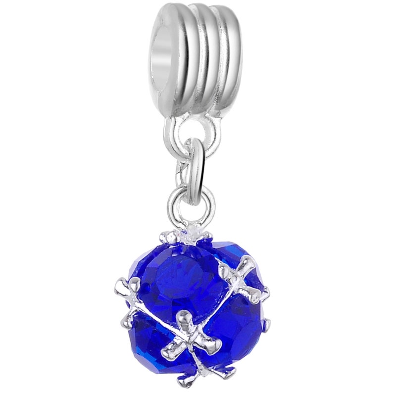 May include: A silver charm featuring a blue crystal ball and a silver bead at the top.