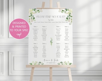 May include: A white wedding seating chart with green foliage and floral accents. The chart lists guest names by table number. The text at the top reads "Please find your seat!" and the bottom reads "Aimee & Jack 27th August 2022".