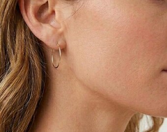 Gold filled endless hoops. B445