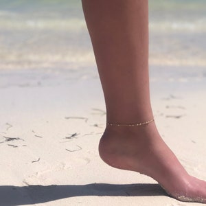 Gold Filled chain with beads anklet on the beach.