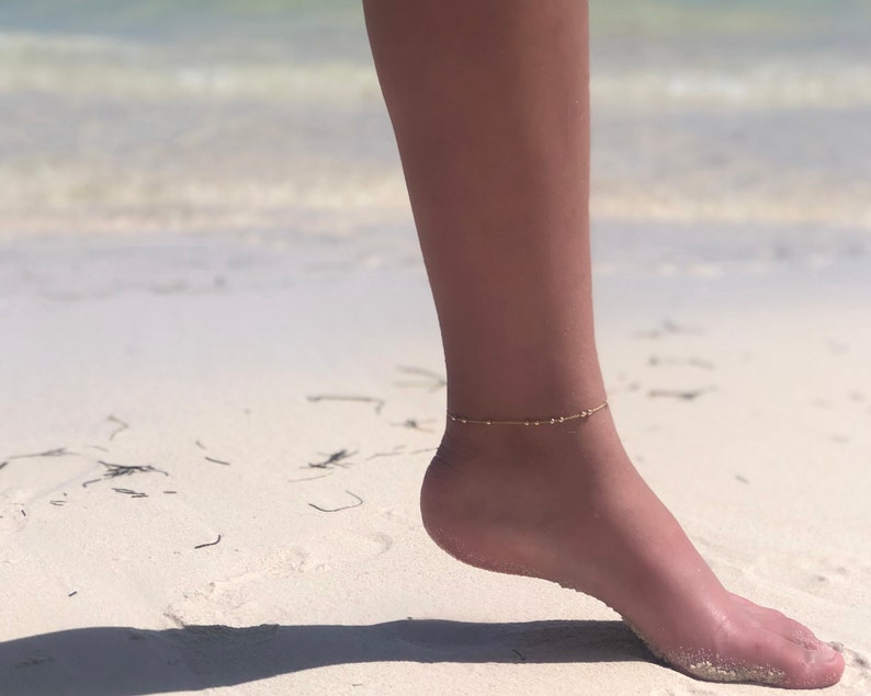 Gold Filled chain with beads anklet on the beach.