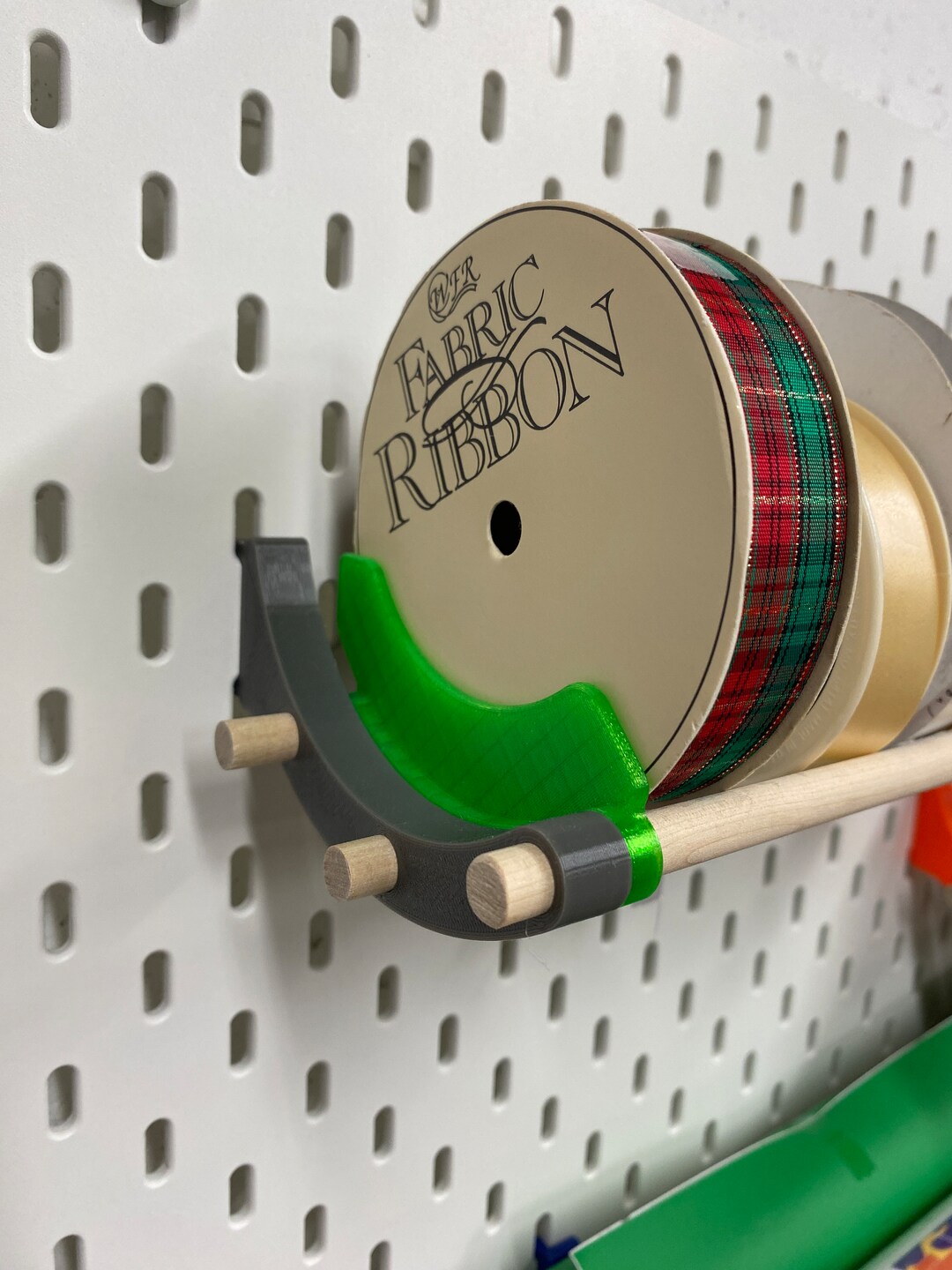 Tape and Ribbon Organizer for Pegboard End Cap Brackets Hooks. Stop