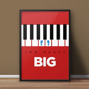 May include: A red poster with a black frame featuring a black and white piano keyboard with blue footprints on the keys. The text "TOM HANKS BIG" is printed in white below the keyboard.