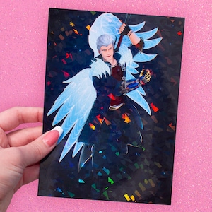 May include: A holographic print featuring a character with white hair, blue wings, and a sword. The character is dressed in a dark coat and red shirt. The background is dark with colorful geometric shapes. The Etsy shop URL is visible at the bottom.