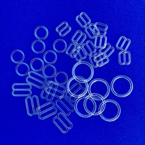 Doorzichtige plastic verstellers van 3/8" of 5/8" doorzichtige plastic verstellers - elke set bevat schuiven en ringen