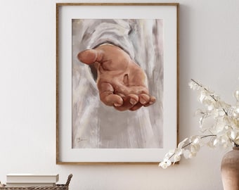 May include: A framed wall art print featuring an oil painting of an open human hand reaching forward. The hand is rendered in warm skin tones with a visible mark on the palm, set against a background of soft, flowing white and grey fabric.
