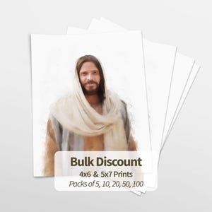 May include: A stack of white paper prints featuring a watercolor-style portrait of a bearded figure with long hair wearing a draped beige garment. Text on the image reads Bulk Discount 4x6 & 5x7 Prints Packs of 5, 10, 20, 50, 100.