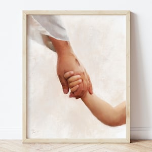 May include: A painting of two hands holding each other. The hand on the left is larger and appears to be a man's hand. The hand on the right is smaller and appears to be a child's hand. The background is a soft, light brown.