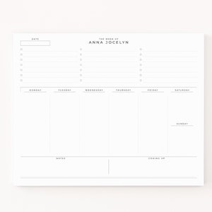 May include: A weekly planner with a simple design. The planner has a space for the date, a section for notes, and a section for "coming up". The planner is divided into seven columns for each day of the week, with the days of the week labeled at the top. The planner is titled "The Week of Anna Jocelyn".