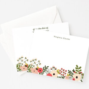 May include: White stationery with a floral border. The text "From the desk of Virginia Clarke" is printed at the top of the card.