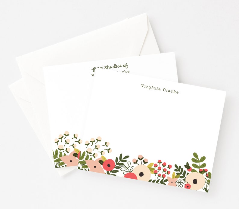 May include: White stationery with a floral border. The text "From the desk of Virginia Clarke" is printed at the top of the card.