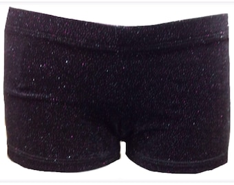 May include: Black sparkly shorts with a pink shimmer. The shorts are made of a soft, stretchy fabric.