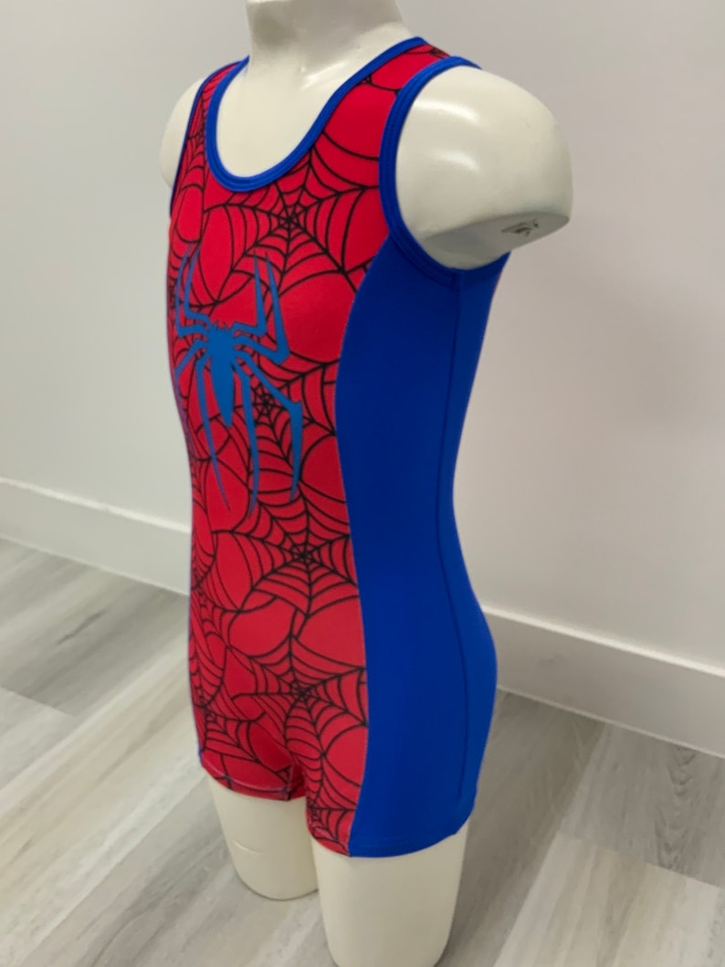 May include: A red and blue sleeveless leotard with a spider web design and a blue spider graphic.