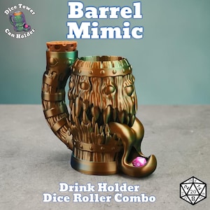 May include: A brown and green Barrel Mimic drink holder and dice roller combo. The design features a barrel-shaped body with a textured, wood-like appearance and a large, open mouth. The text "Barrel Mimic" is displayed above the product.