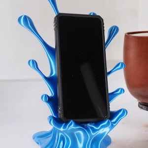 Water Splash Phone Stand, Customizable Colors, Charging Cable Accessibility, 3D Printed