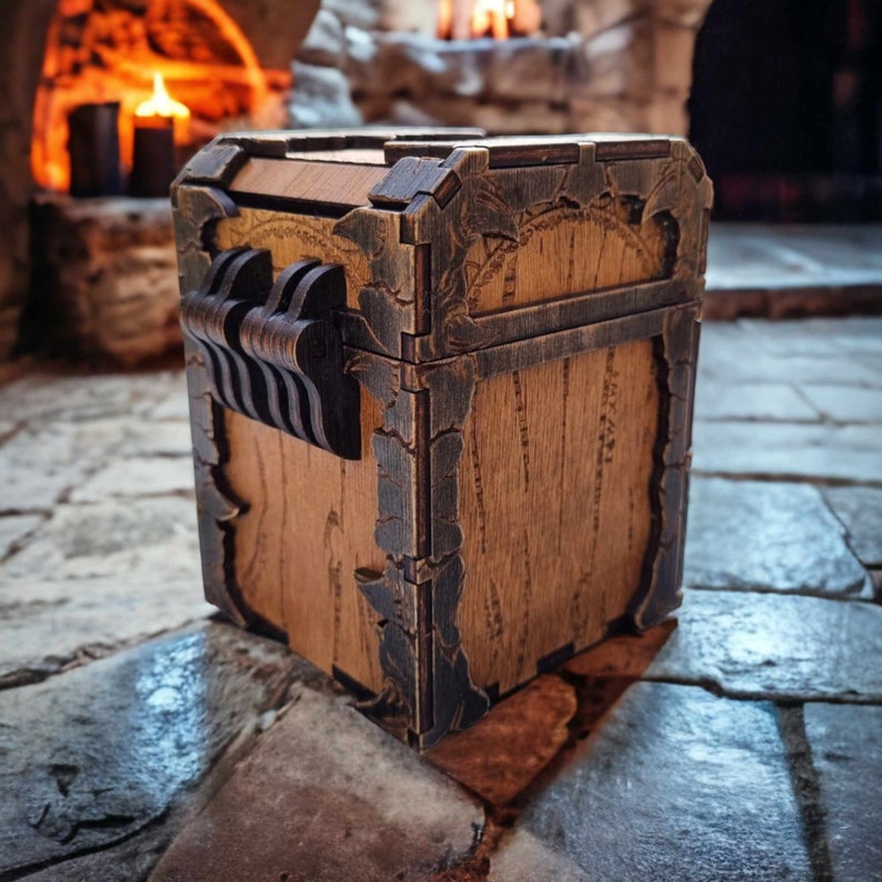 May include: A wooden chest with decorative metal accents. The chest is rectangular with a hinged lid and a series of vertical, curved handles. The metal accents are dark and ornate, contrasting with the light brown wood. The chest is likely for storage.