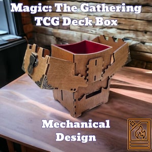 May include: A wooden deck box with the text "Magic: The Gathering TCG Deck Box" and "Mechanical Design". The box has a red interior and is open, revealing the inside. The box is made of wood and has a decorative metal clasp.