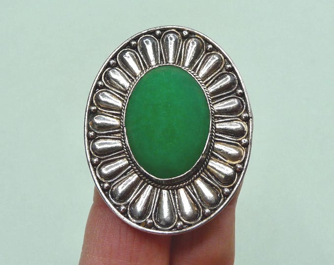 Vintage silver and green resin brooch.