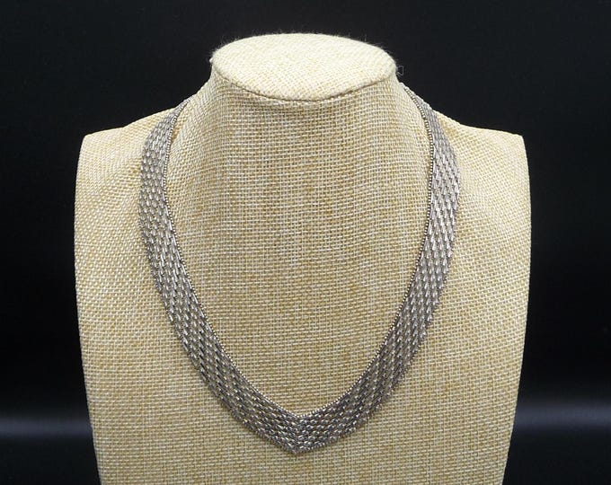 Silver necklace with a gold-plated finish. Vintage.