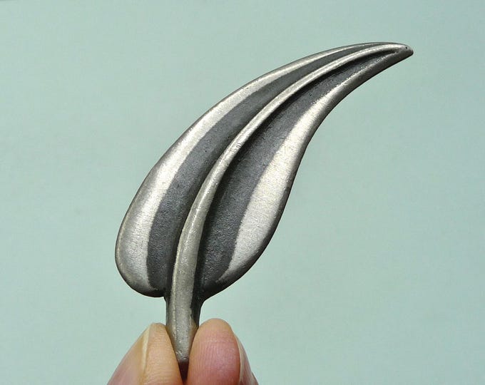 Sweden. Vintage tinplate brooch.