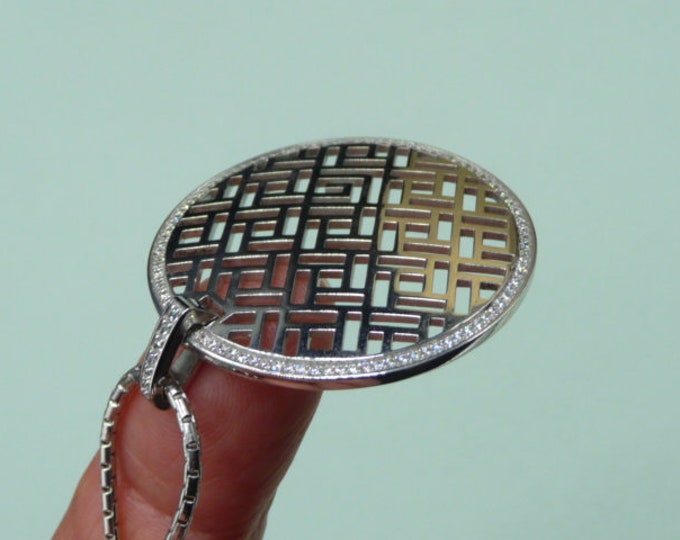 Guy Laroche (France). Silver and zircon pendant.