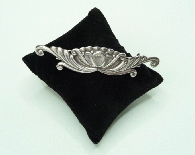 Long silver brooch. Vintage.
