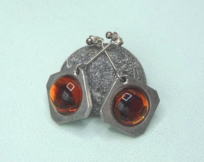 Vintage tinplate earrings made in Sweden.